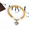 Detail of beaded gold bracelet featuring freshwater pearls and a sparkling heart pendant - Rhinestone Heart Pendant (Style 2)