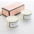 Close-up of two handmade aromatherapy candles in frosted glass jars with pink gift box - Frosted White - Blue Bell