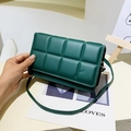 Quilted crossbody bag in deep green PU leather with minimalist flap and slender strap - Dark Green