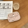 Quilted pink card holder pouch with red cherry patterns on a natural wooden table - Pink Cherry