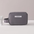 Sleek grey waterproof memory cloth makeup bag with side handle and top zipper closure - Grey Small
