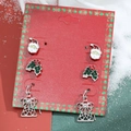 Three pairs of Christmas theme stud earrings including Santa Claus and holly on festive card - 3-Pair Santa Claus Set (H-149)