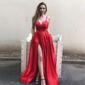 Elegant red satin evening dress with thin straps, deep V-neck, and high leg slit detail - US size 12 (L) / Red