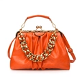 Orange pleated PU leather handbag with gold chunky chain and vintage kiss lock closure - Orange