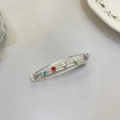 Detail von sternförmigen Haarklammern aus Glitzerharz mit bunten funkelnden Stern-Anhängern - Ca. 6,6 cm / Transparent Weiß - Stern
