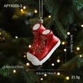 Ornamenti natalizi a forma di sneaker rosse glitterate con lacci dorati su albero - Stile Scarpa di Tela