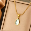 Titanium steel snake chain necklace with a light blue teardrop crystal pendant in gold - Gold Snake Chain Waterdrop Blue Gemstone Necklace (JX076-Blue)