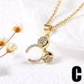 Gold Mickey Mouse pendant necklace with sparkling white rhinestones on white fabric - C-Bowknot