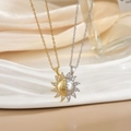 Macro detail of sun-shaped puzzle necklaces with You Are MY Sunshine engraving and cubic zirconia - Gold Silver Sun You Are My Sunshine XL0482A