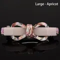 Large apricot acetate bow hair clip with marble pattern and sparkling rhinestones - Large / Apricot