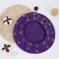 Top view of a purple beret with silver metal eyelets and rings on a clean background - 27.5*7cm / Purple