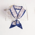 Navy floral narrow silk scarf twilly with red leaf pattern tied on a white grid - Navy Floral