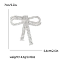 Elegante spilla a fiocco argento con strass di diamanti, dimensioni 7 cm x 6,6 cm - Argento