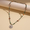 Dettaglio della collana bohémien con pietre verdi e ciondolo con sole e luna - Acciaio Inossidabile/Lega/Acrilico/Perline Fatte a Mano / Stile con Perline e Ciondolo Sole Luna (Collana-Argento)