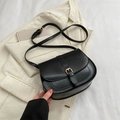 Minimalist black PU saddle bag featuring a stylish gold buckle and crossbody strap - Black