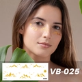 Metallic gold freckle tattoo sticker with mountain and bird pattern on face, model VB-025 - Mountains and Birds (VB-025)
