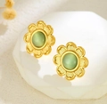 Vintage golden flower stud earrings with cat-eye green stone and textured petals - Striped Texture Cat Eye Flower