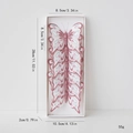 Pink Christmas glitter butterfly ornaments in a display box with size measurements - Style G (Large)