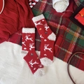 Thick coral fleece Christmas socks featuring red color and white reindeer patterns - Beige Reindeer