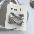 Set of two silver metallic bow hair clips handmade for women on white card - Leather Knotted Bow / Silver