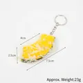 Realistischer Schlüsselanhänger Kürbis Tempura aus PVC mit Silberkette, 7,5 cm Länge - Panierter Kürbisstreifen - Schlüsselanhänger