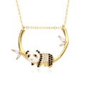Detail view of gold-plated panda pendant with black and white zircon micro-paving - Panda