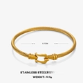Golden stainless steel cable bracelet with horseshoe clasp and twisted wire design - Gold Horseshoe Buckle Bangle