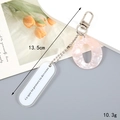 Pink marble acrylic keychain with silver hardware measuring 13.5cm and weighing 10.3g - Letter O