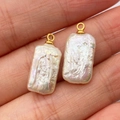 Rectangle baroque pearl pendants with golden rings shown on palm for jewelry DIY - Freshwater Pearl
