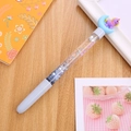 Cute liquid quicksand gel pen featuring purple unicorn and moon charms on wood surface - Quicksand Moon Unicorn Pen Blue