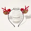 Detail of Christmas headband with red reindeer antlers and plaid bow on display - Christmas Antler Headband - Bowknot Pom Red