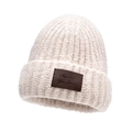 Chunky knit wool blend beanie in oatmeal beige with a premium brown leather logo patch - Beige