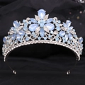 Detail of silver alloy crown featuring light blue teardrop stones and sparkling crystals - H1370 Silver White + Blue Opal