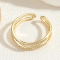 Close-up of gold plated multi-layer ring with sparkling zircon stones and open design - Double Layer Open Ring