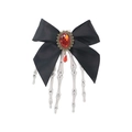 Gothic Halloween hair clip featuring a black bow, red gemstone, and bronze relief detail - Red Gem Vintage Bow - Vintage Skeleton Hand
