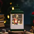 Vintage green Christmas lantern with gnome and snowman figures featuring warm LED light - Small Vintage Green Santa Claus