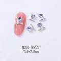 Macro view of 3D purple heart crystal nail gems with silver metal bar and tiny rhinestones - Purple Style (8837)