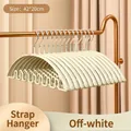 Beige non-slip wave hanger with curved seamless design and strap hooks, 42x20cm size - Off White
