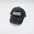 Detail of white chenille MINI embroidery on a vintage washed dark grey baseball cap - Kids MINI / Black