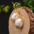 Baroque pearl earrings with 18k gold plated leaf detailing and zircon hooks - Natural Pearl Silver Hook