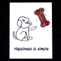Red natural crystal agate stone carved in dog bone shape on healing message card - Sesame Stone