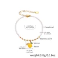 Faux pearl and stainless steel bead bracelet with a yellow resin lemon charm pendant - Single Lemon Pendant Beaded Style (TXE288-1)