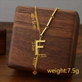 Polished titanium steel gold necklace featuring letter F pendant and elegant tassel charm - Letter F / Gold