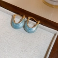 U-shaped gold-plated earrings with light blue pearlescent enamel on jewelry tray - 49# Earring - Blue