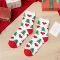 Detail of Christmas coral fleece socks with festive tree patterns and soft plush texture - White Heart and Tree