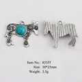 Ethnic donkey pendant with turquoise stone and floral patterns, size 30x25mm - Sunflower Horse