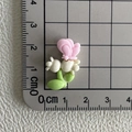 Pink butterfly on white flower resin accessory measured with a ruler showing 2cm height - 16*Butterfly Bluebell