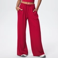 Detail of red wide-leg trousers with drawstring waist and soft draped fabric texture - S / Red