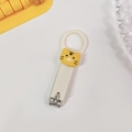 Portable stainless steel nail clipper with white handle and cute yellow tiger mascot - Beige Tiger