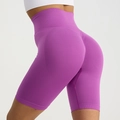 High-waist purple yoga shorts with scrunch butt lifting effect for fitness training - Deep purple